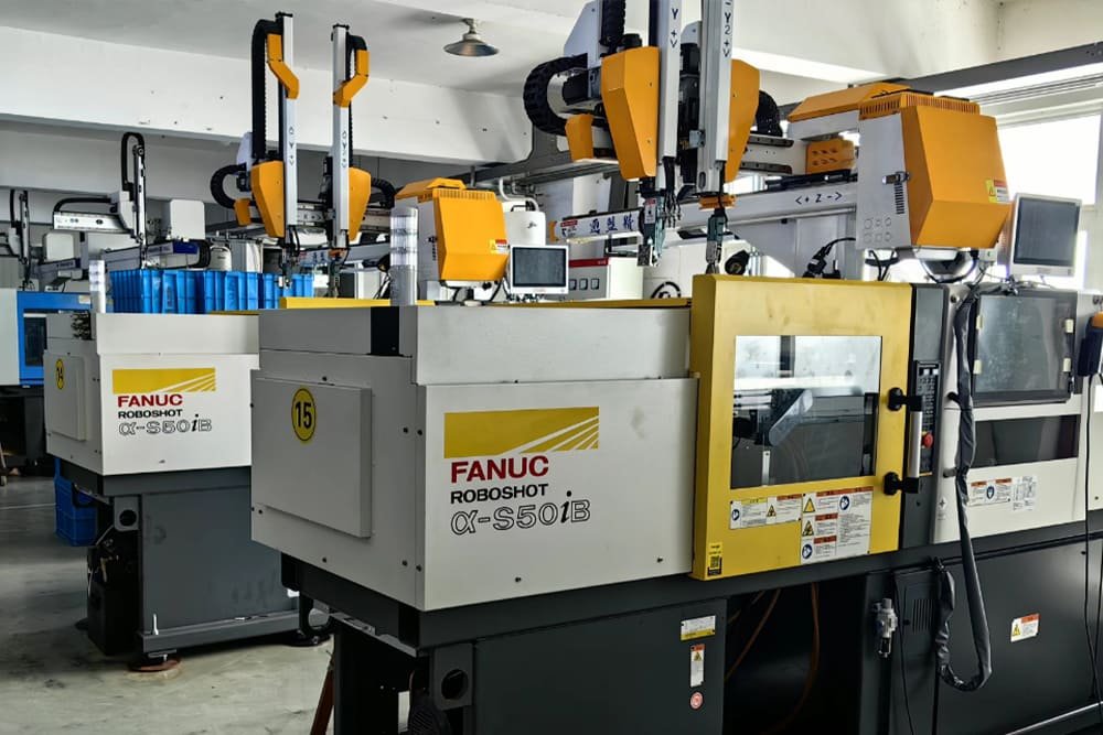 FANUC Roboshot all-electric injection molding machines on the production floor of a precision plastic gear factory