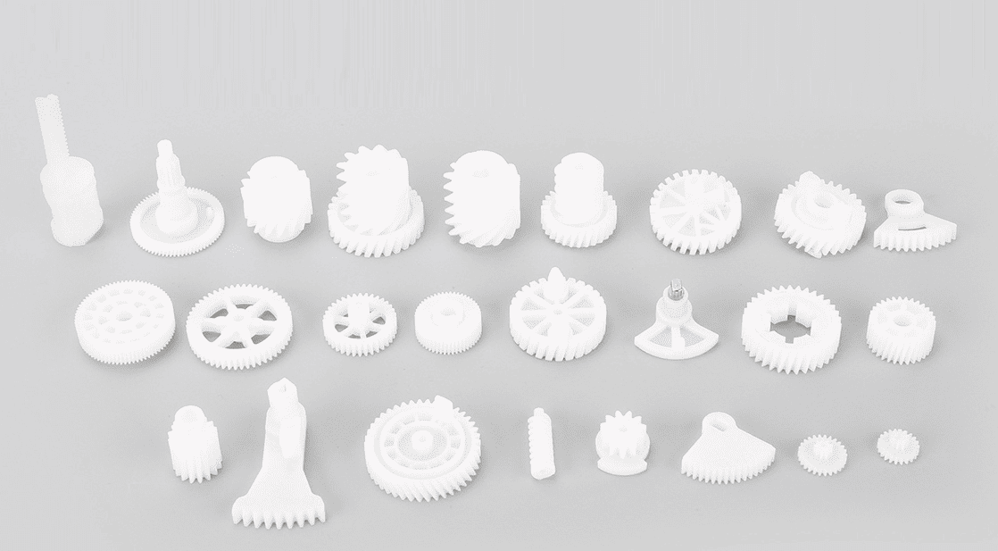 LiCoom precision plastic gear components Ultra-precise white plastic gear components including spur gears, helical gears and worm gears manufactured to tight tolerances