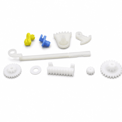 Custom plastic motion components set including gears racks and linkages